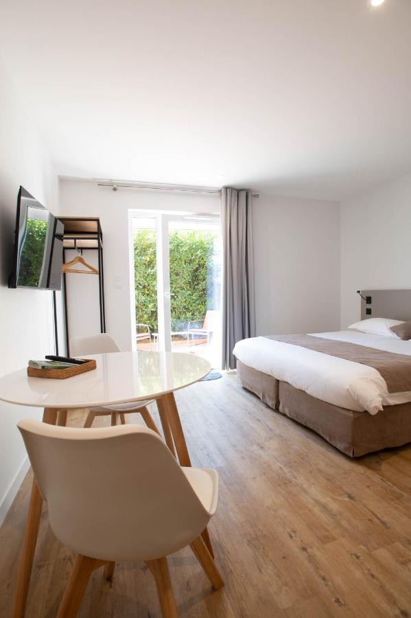 Logis Les Cepages / Restaurant Le Raisin Apartment Понт-де-Во Екстериор снимка